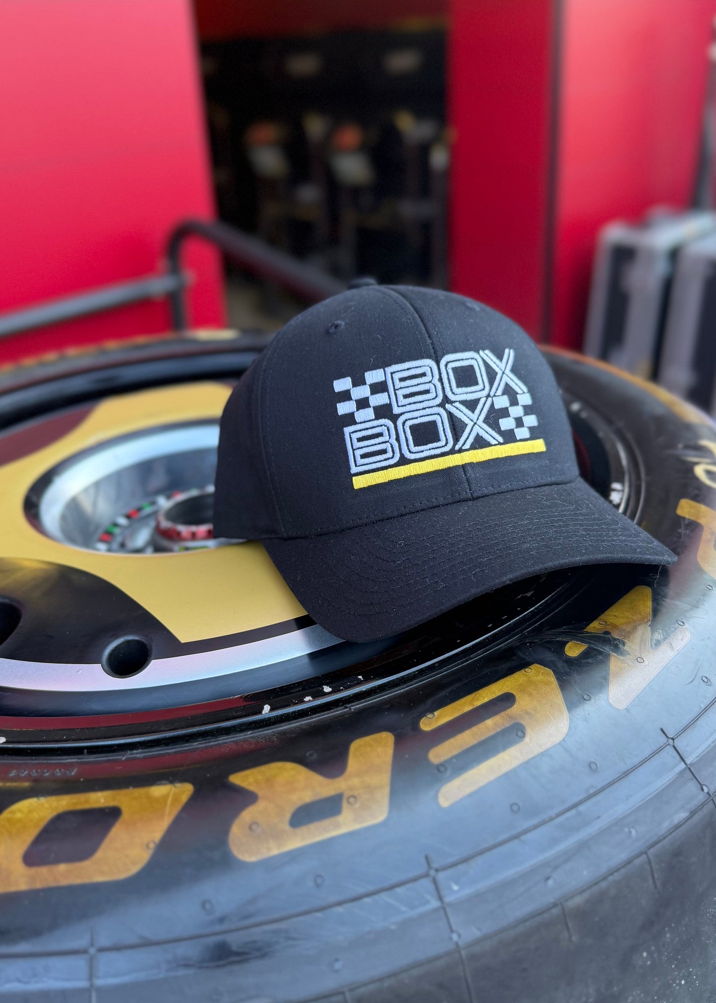 Box Box Yellow Stripe Trucker Hat