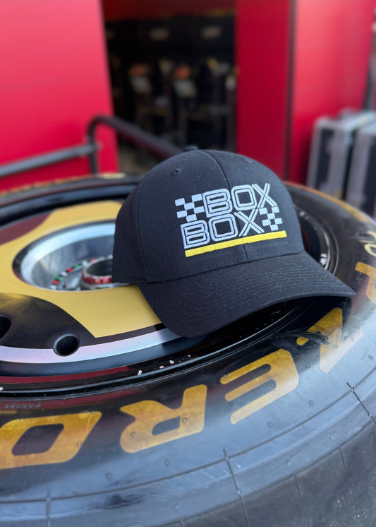 Box Box Yellow Stripe Trucker Hat